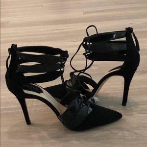 Black lace up pumps